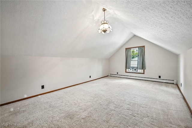 1683 Ridgewood Dr, Salem, OH 44460 - bonus room with baseboard heating, carpet, a textured ceiling, and vaulted ceiling