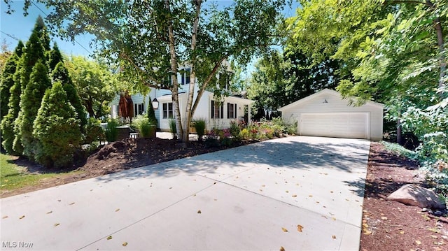 43 S St, Chagrin Falls, OH 44022 - view of front of house featuring an outdoor structure and a garage