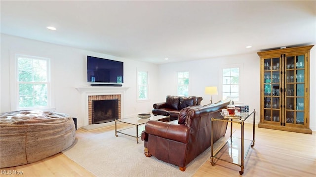 43 S St, Chagrin Falls, OH 44022 - living area featuring light wood-style floors, recessed lighting, and a brick fireplace