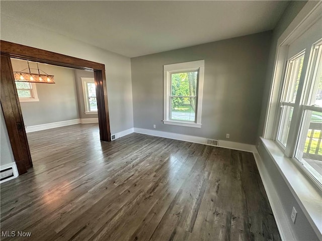 38 Franklin Ave, Niles, OH 44446 - unfurnished room with dark wood finished floors and healthy amount of natural light