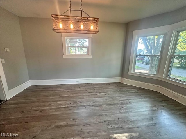 38 Franklin Ave, Niles, OH 44446 - unfurnished dining area with wood finished floors and baseboards