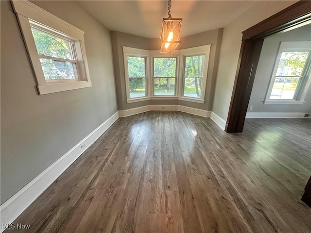 38 Franklin Ave, Niles, OH 44446 - unfurnished dining area featuring healthy amount of natural light and dark wood-type flooring