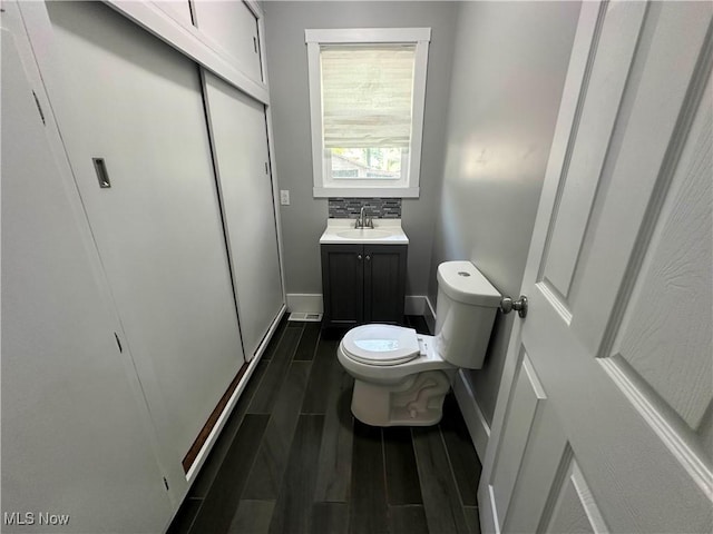 38 Franklin Ave, Niles, OH 44446 - half bathroom featuring vanity and wood finished floors