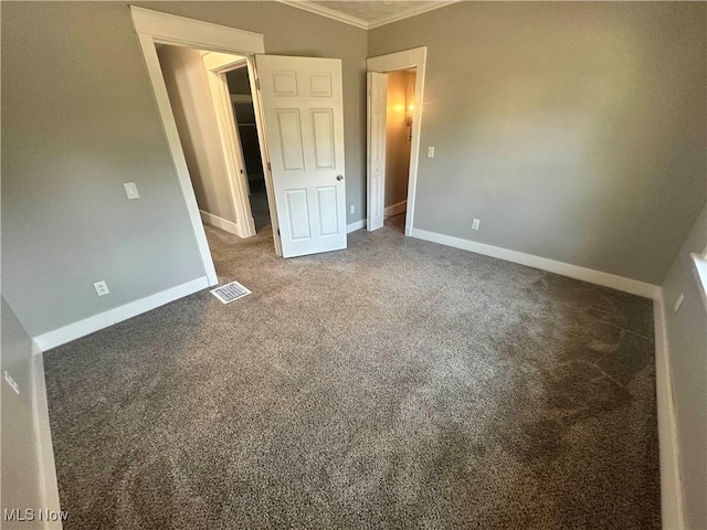 38 Franklin Ave, Niles, OH 44446 - unfurnished bedroom with ornamental molding and carpet