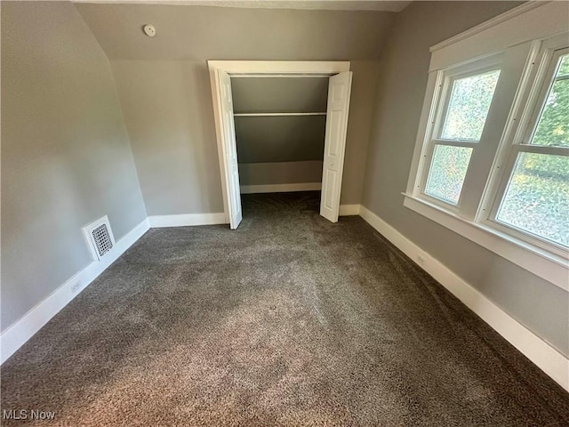 38 Franklin Ave, Niles, OH 44446 - unfurnished bedroom featuring dark carpet and a closet