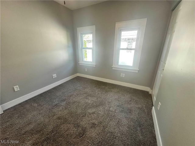 38 Franklin Ave, Niles, OH 44446 - unfurnished room featuring dark colored carpet and baseboards