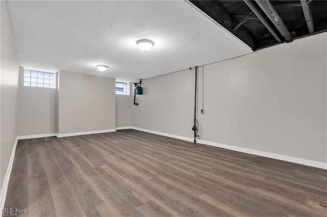3781 Washington Blvd, University Heights, OH 44118 - basement with healthy amount of natural light and wood finished floors