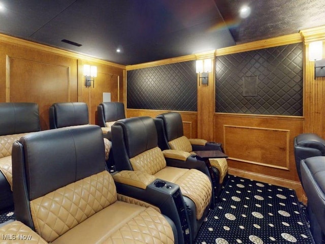 2474 Ginger Wren Rd, Pepper Pike, OH 44124 - carpeted home theater room with ornamental molding, a decorative wall, recessed lighting, and wooden walls