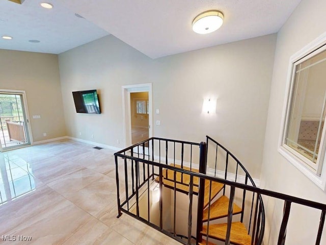 2474 Ginger Wren Rd, Pepper Pike, OH 44124 - stairway with tile patterned flooring and recessed lighting