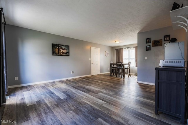 1582 Hilda Ave, Lakemore, OH 44250 - living area with wood finished floors and a textured ceiling