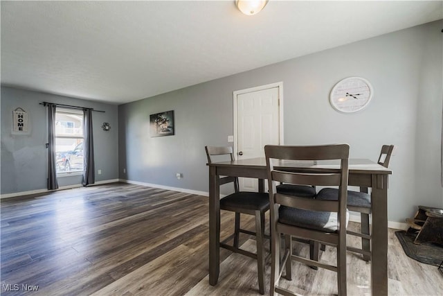 1582 Hilda Ave, Lakemore, OH 44250 - dining room with wood finished floors and baseboards