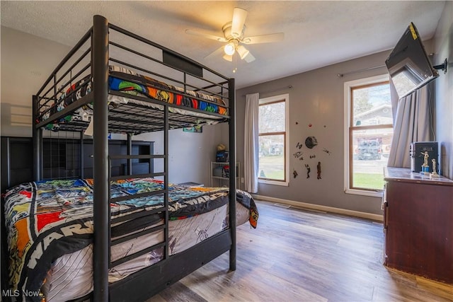 1582 Hilda Ave, Lakemore, OH 44250 - bedroom with wood finished floors and ceiling fan