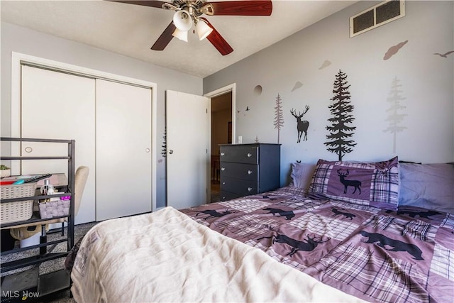 1582 Hilda Ave, Lakemore, OH 44250 - bedroom featuring a closet and a ceiling fan