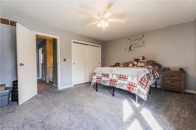 1582 Hilda Ave, Lakemore, OH 44250 - carpeted bedroom featuring a closet and ceiling fan