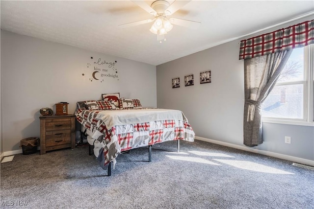 1582 Hilda Ave, Lakemore, OH 44250 - carpeted bedroom featuring baseboards and a ceiling fan