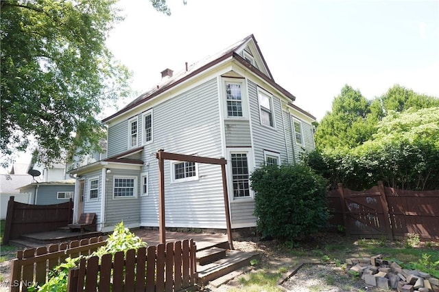 664 N Ellsworth Ave, Salem, OH 44460 - back of house with a chimney