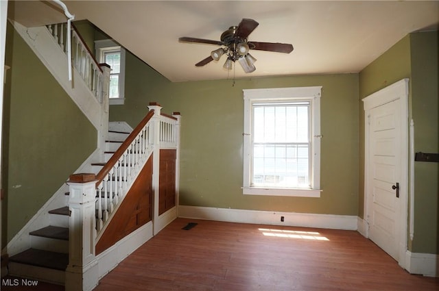 664 N Ellsworth Ave, Salem, OH 44460 - staircase with wood finished floors and a ceiling fan