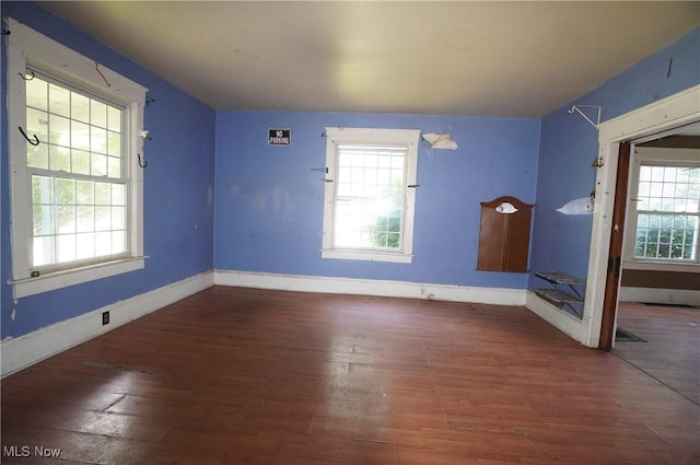 664 N Ellsworth Ave, Salem, OH 44460 - unfurnished room with wood finished floors and healthy amount of natural light