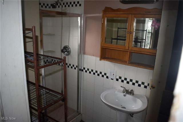 664 N Ellsworth Ave, Salem, OH 44460 - full bathroom with a stall shower, tile walls, and tasteful backsplash