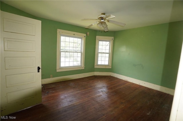 664 N Ellsworth Ave, Salem, OH 44460 - spare room featuring dark wood-type flooring and ceiling fan