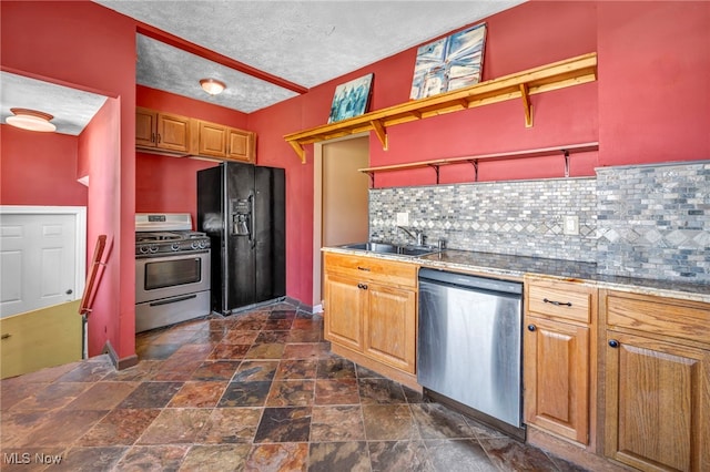 3303 Tuxedo Ave, Parma, OH 44134 - kitchen featuring stainless steel appliances, open shelves, decorative backsplash, dark stone finish flooring, and a textured ceiling