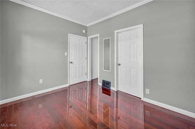 3303 Tuxedo Ave, Parma, OH 44134 - unfurnished bedroom with crown molding and wood finished floors