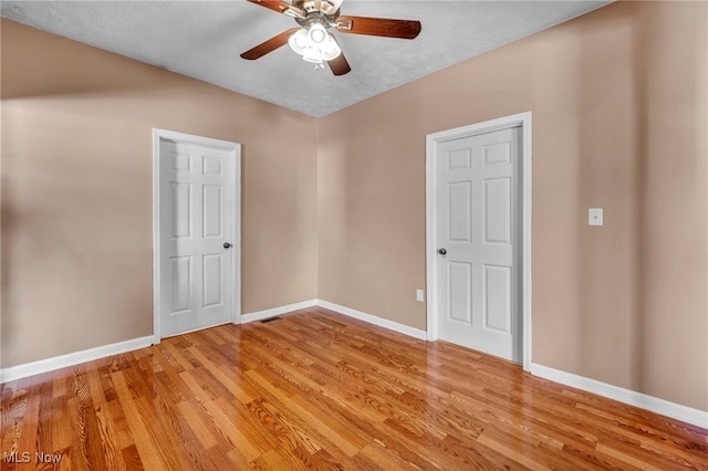 3303 Tuxedo Ave, Parma, OH 44134 - spare room with ceiling fan and light wood finished floors