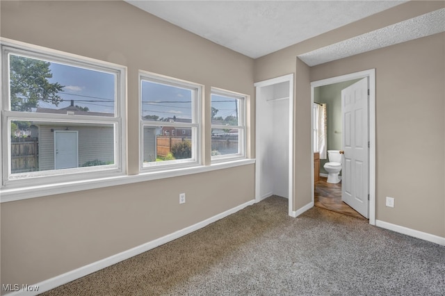 3303 Tuxedo Ave, Parma, OH 44134 - unfurnished bedroom with carpet floors and baseboards