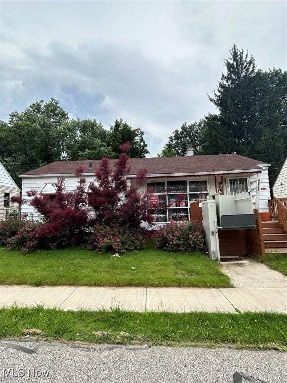 9822 Way Ave, Cleveland, OH 44105 - single story home featuring a front lawn