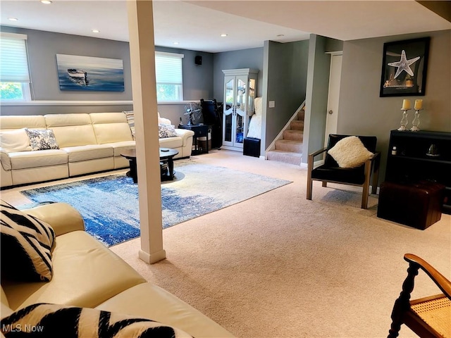 2977 Pirates Cv, Aurora, OH 44202 - living room with carpet floors, stairway, and recessed lighting