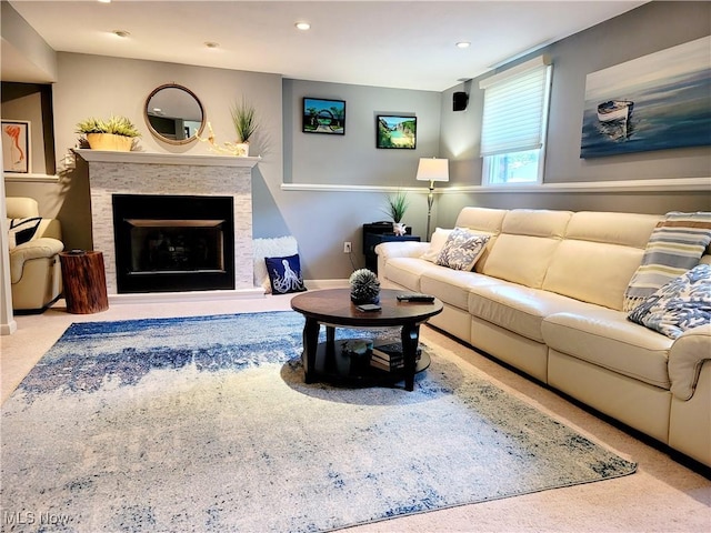 2977 Pirates Cv, Aurora, OH 44202 - carpeted living area featuring recessed lighting and a stone fireplace