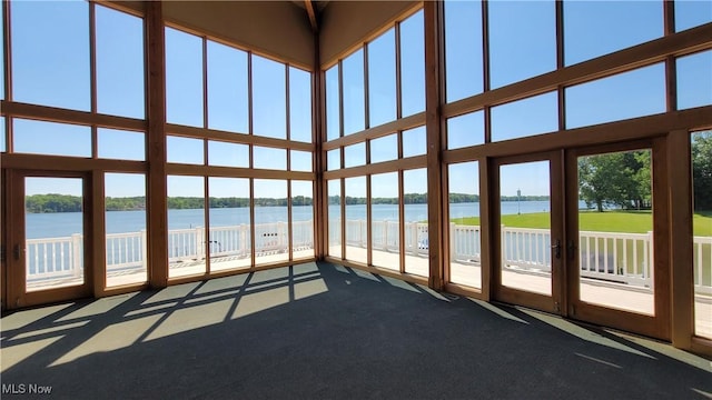 2977 Pirates Cv, Aurora, OH 44202 - unfurnished sunroom featuring a water view and plenty of natural light