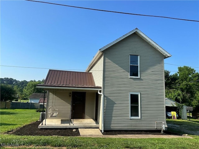 16707 Terrace Ave, Caldwell, OH 43724 - back of property with a metal roof
