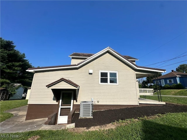 16707 Terrace Ave, Caldwell, OH 43724 - back of house with a yard