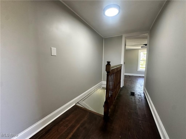 16707 Terrace Ave, Caldwell, OH 43724 - hallway featuring an upstairs landing and dark wood finished floors
