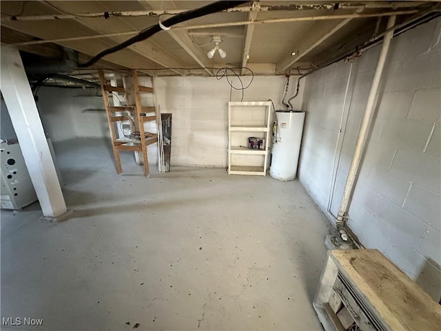 16707 Terrace Ave, Caldwell, OH 43724 - unfinished basement with water heater and concrete block wall