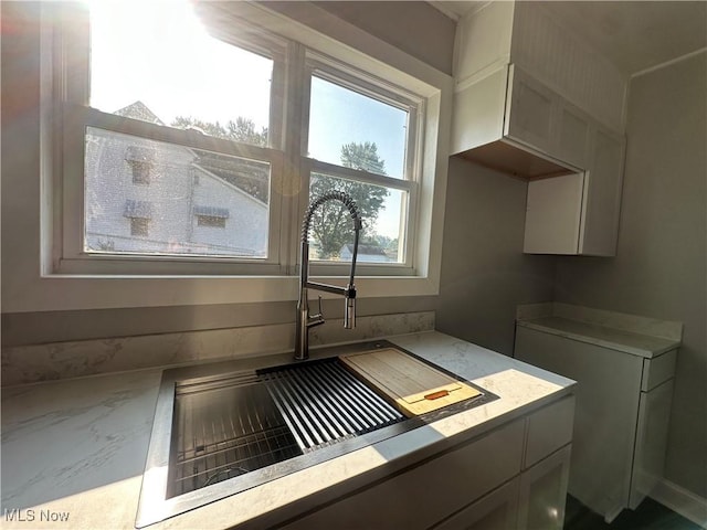 16707 Terrace Ave, Caldwell, OH 43724 - kitchen featuring a sink and light countertops