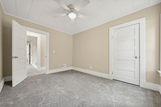 6434 Union Ave NE, Alliance, OH 44601 - spare room with carpet and ceiling fan