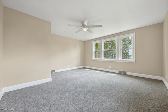 6434 Union Ave NE, Alliance, OH 44601 - carpeted spare room with ceiling fan and baseboards