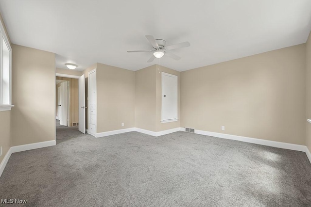 6434 Union Ave NE, Alliance, OH 44601 - spare room featuring ceiling fan and carpet