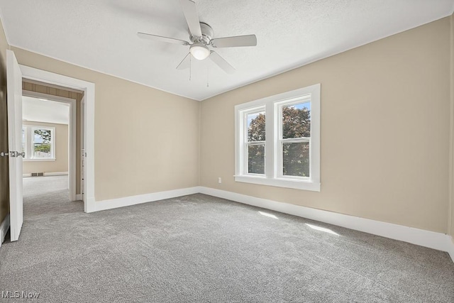 6434 Union Ave NE, Alliance, OH 44601 - carpeted spare room with baseboards and ceiling fan