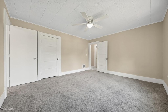 6434 Union Ave NE, Alliance, OH 44601 - unfurnished bedroom featuring carpet, ornamental molding, and ceiling fan