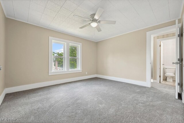 6434 Union Ave NE, Alliance, OH 44601 - carpeted empty room with ceiling fan and ornamental molding