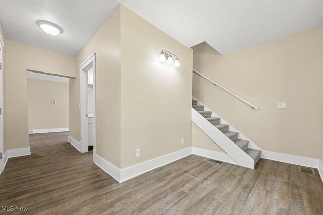 6434 Union Ave NE, Alliance, OH 44601 - foyer entrance featuring wood finished floors and stairs