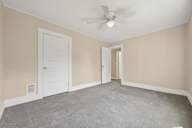 6434 Union Ave NE, Alliance, OH 44601 - empty room with carpet floors and a ceiling fan