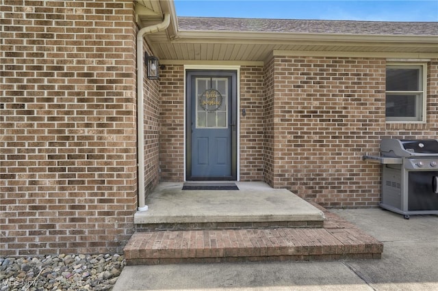 45330 Maple View Cir, Caldwell, OH 43724 - view of exterior entry featuring brick siding