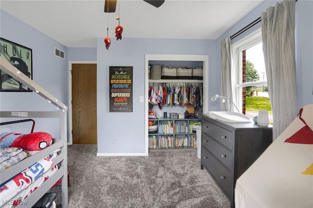 45330 Maple View Cir, Caldwell, OH 43724 - bedroom featuring a closet, carpet, and a ceiling fan