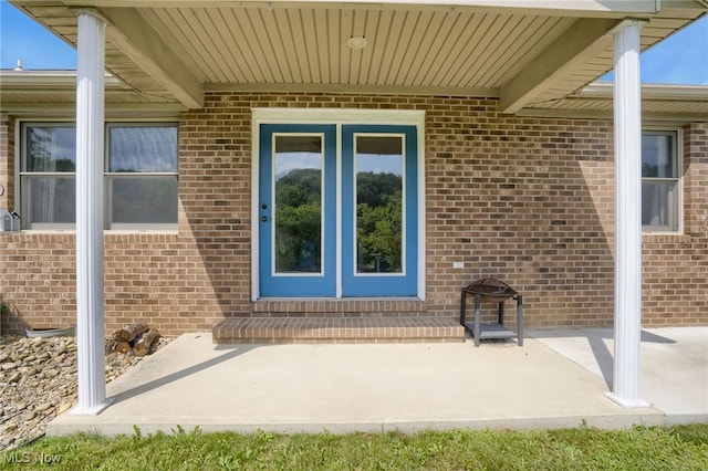 45330 Maple View Cir, Caldwell, OH 43724 - doorway to property with brick siding and a patio