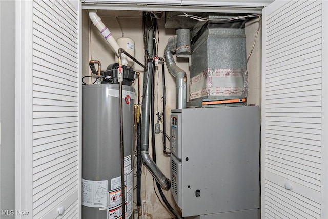 3498 Clayton Dr, North Olmsted, OH 44070 - utility room featuring water heater and heating unit