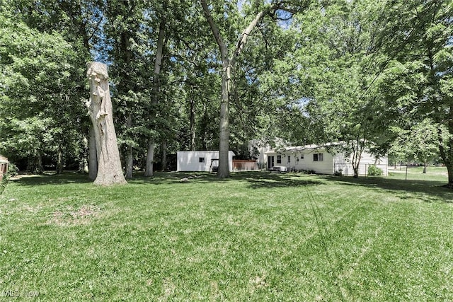 3498 Clayton Dr, North Olmsted, OH 44070 - view of yard featuring a shed